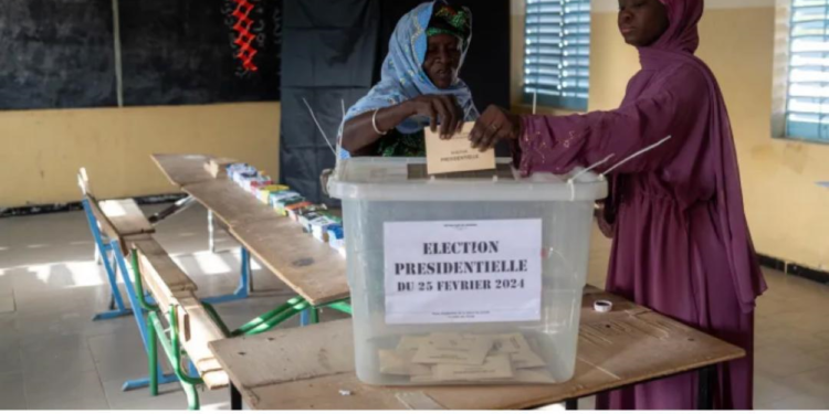 Senegal votes in delayed presidential election